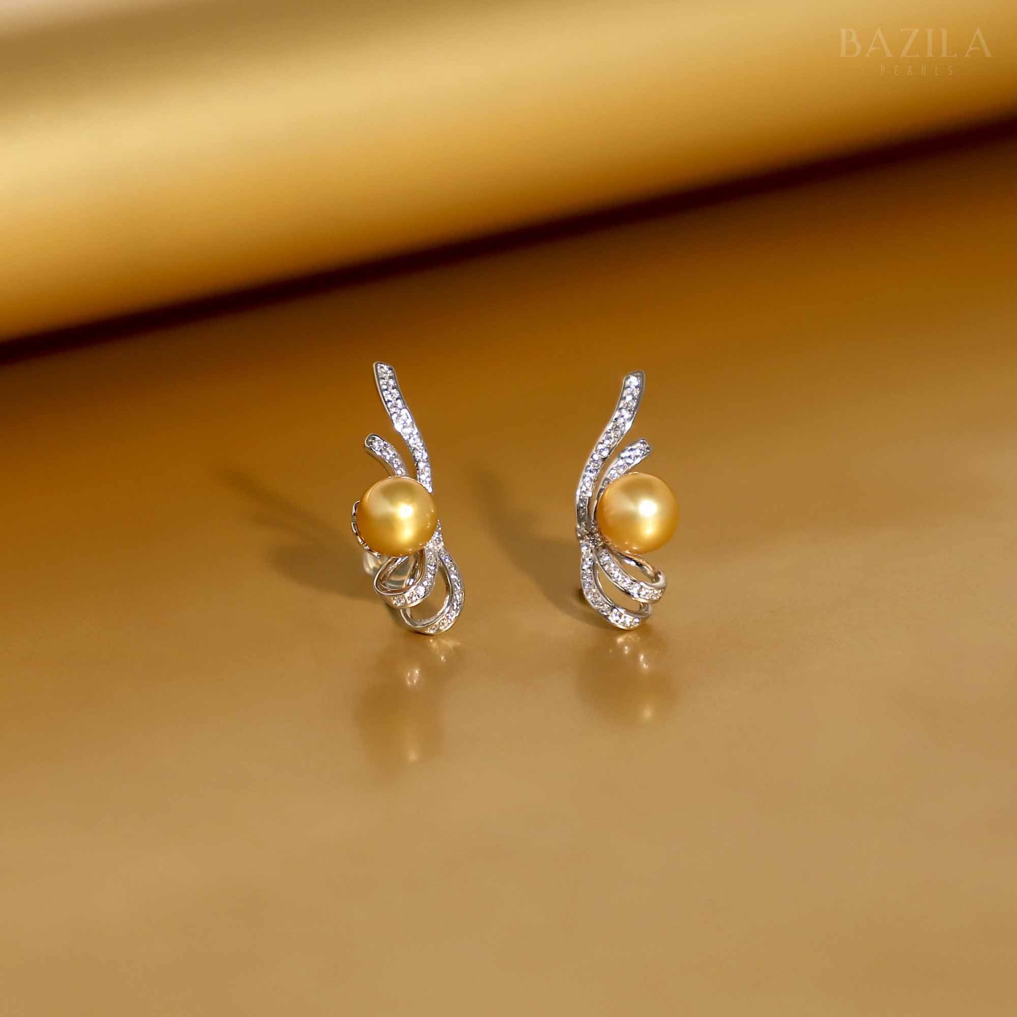 Golden Sea Pearl Earrings with Elegant Swirl Design